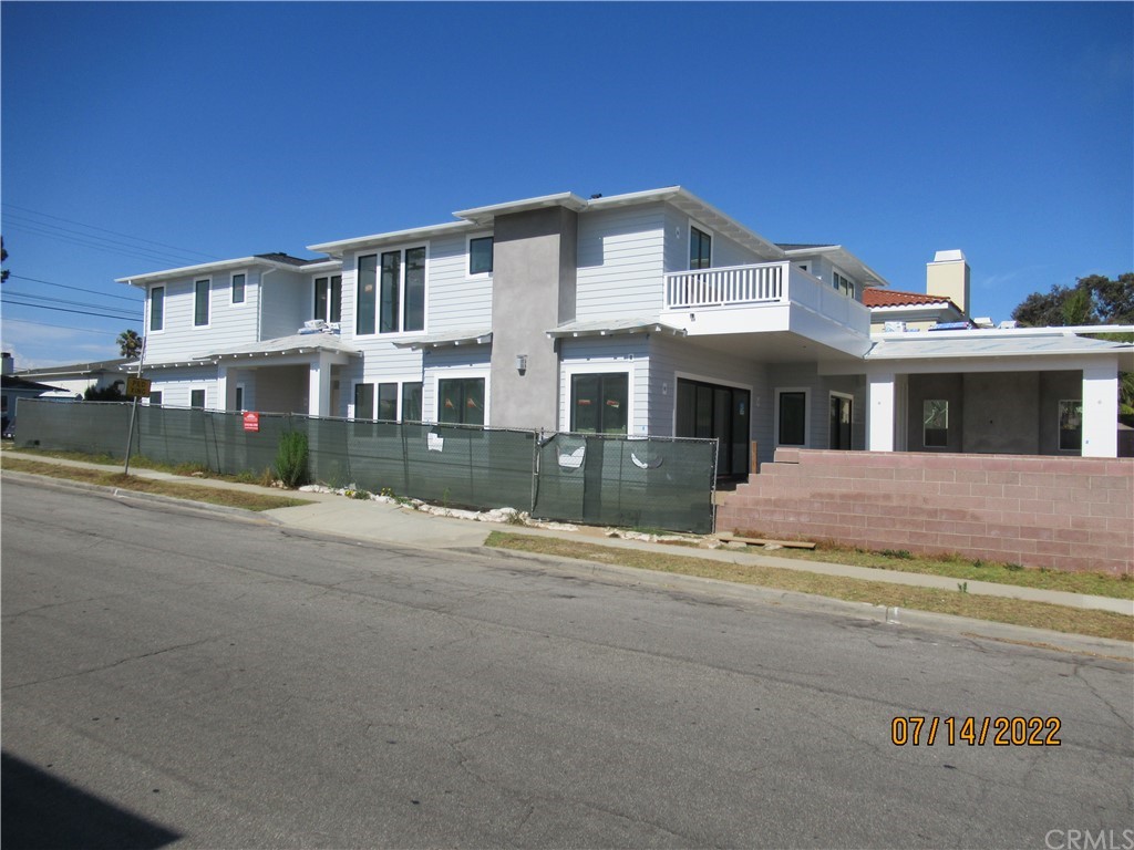 1300 11th Street Manhattan Beach, CA 90266 - Photo 1 of 19 a view of street with large house