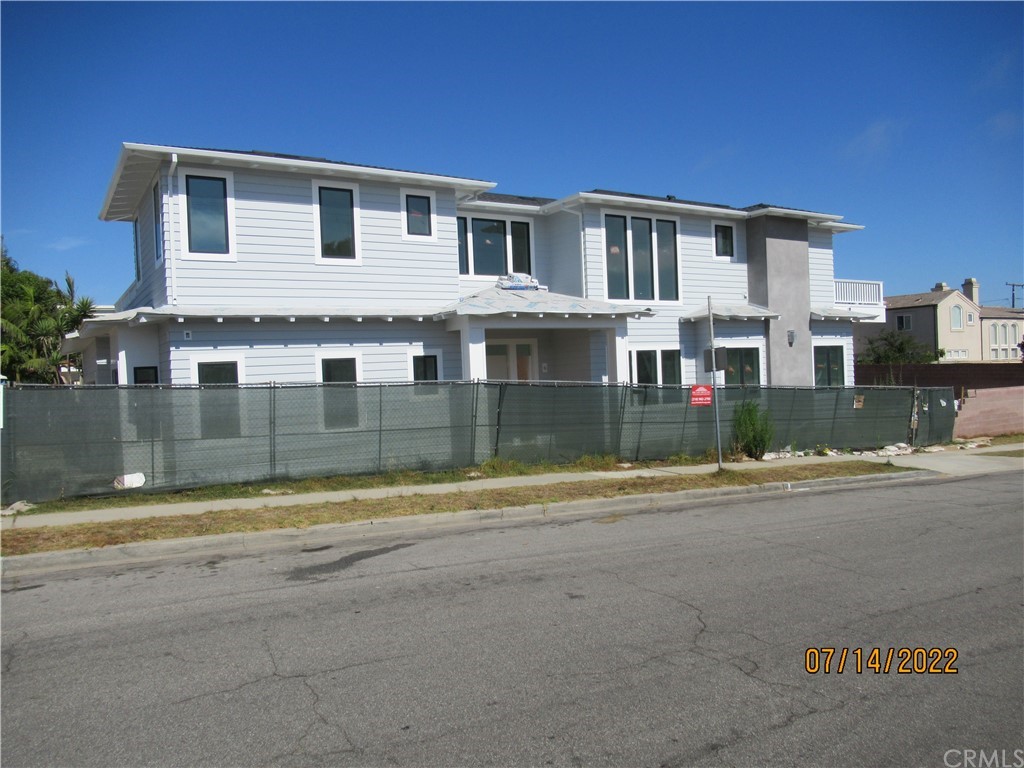 1300 11th Street Manhattan Beach, CA 90266 - Photo 2 of 19 a view of a house with a swimming pool