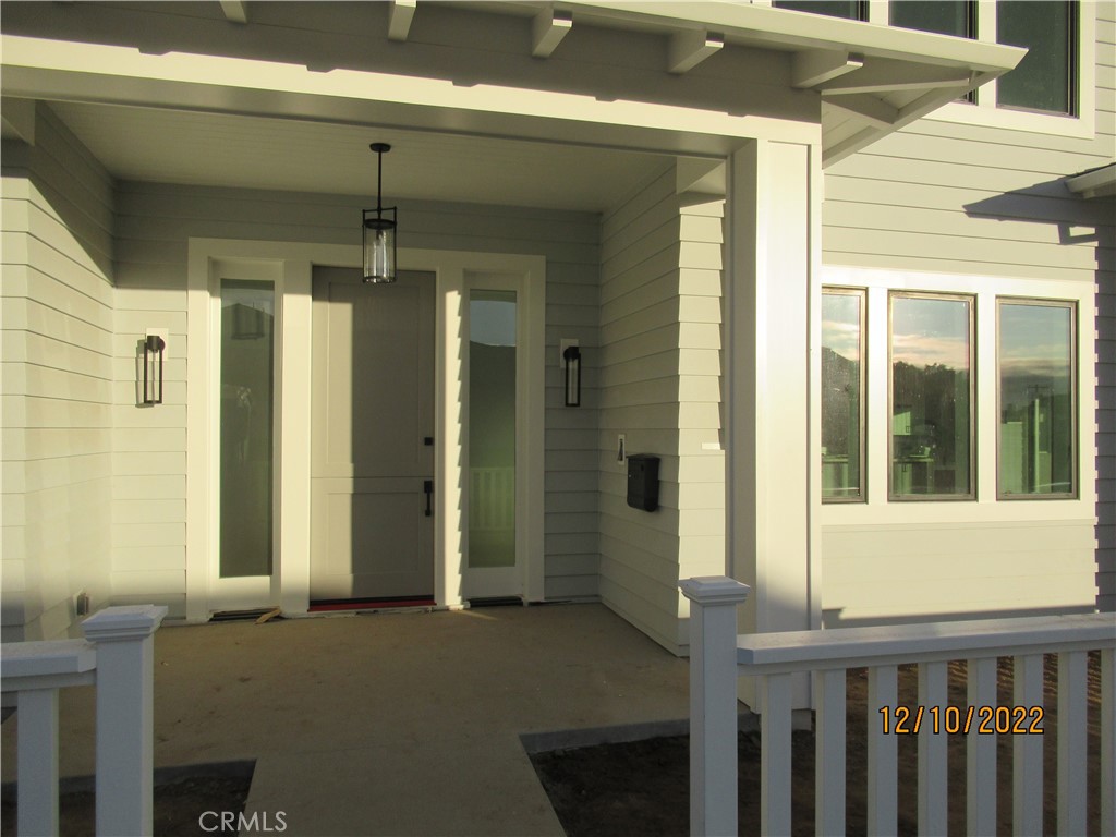 1300 11th Street Manhattan Beach, CA 90266 - Photo 6 of 19 a view of a porch with a table and chairs