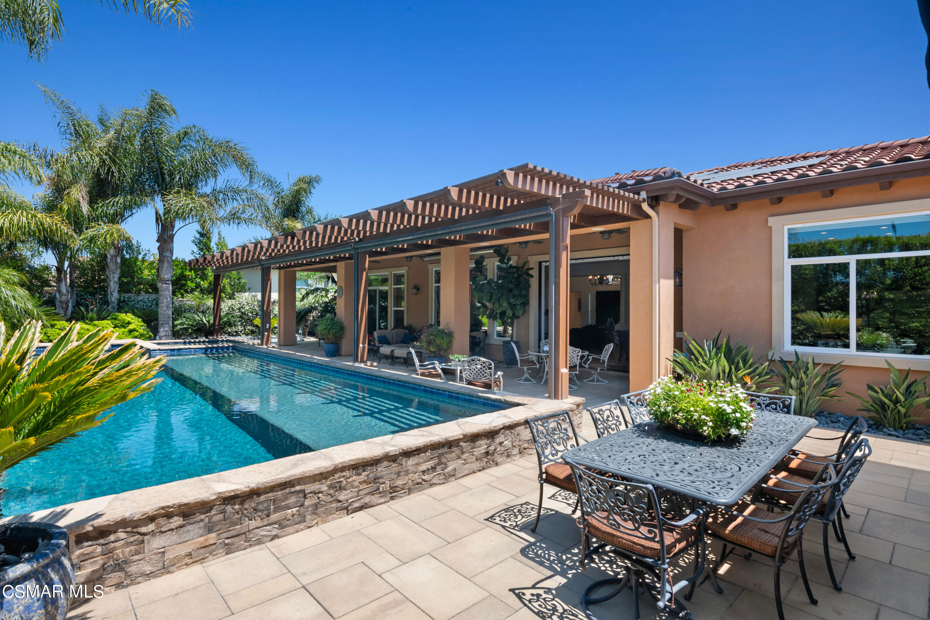 11342 Raes Creek Road Moorpark, CA 93021 - Photo 36 of 70 a view of a house with swimming pool and sitting area