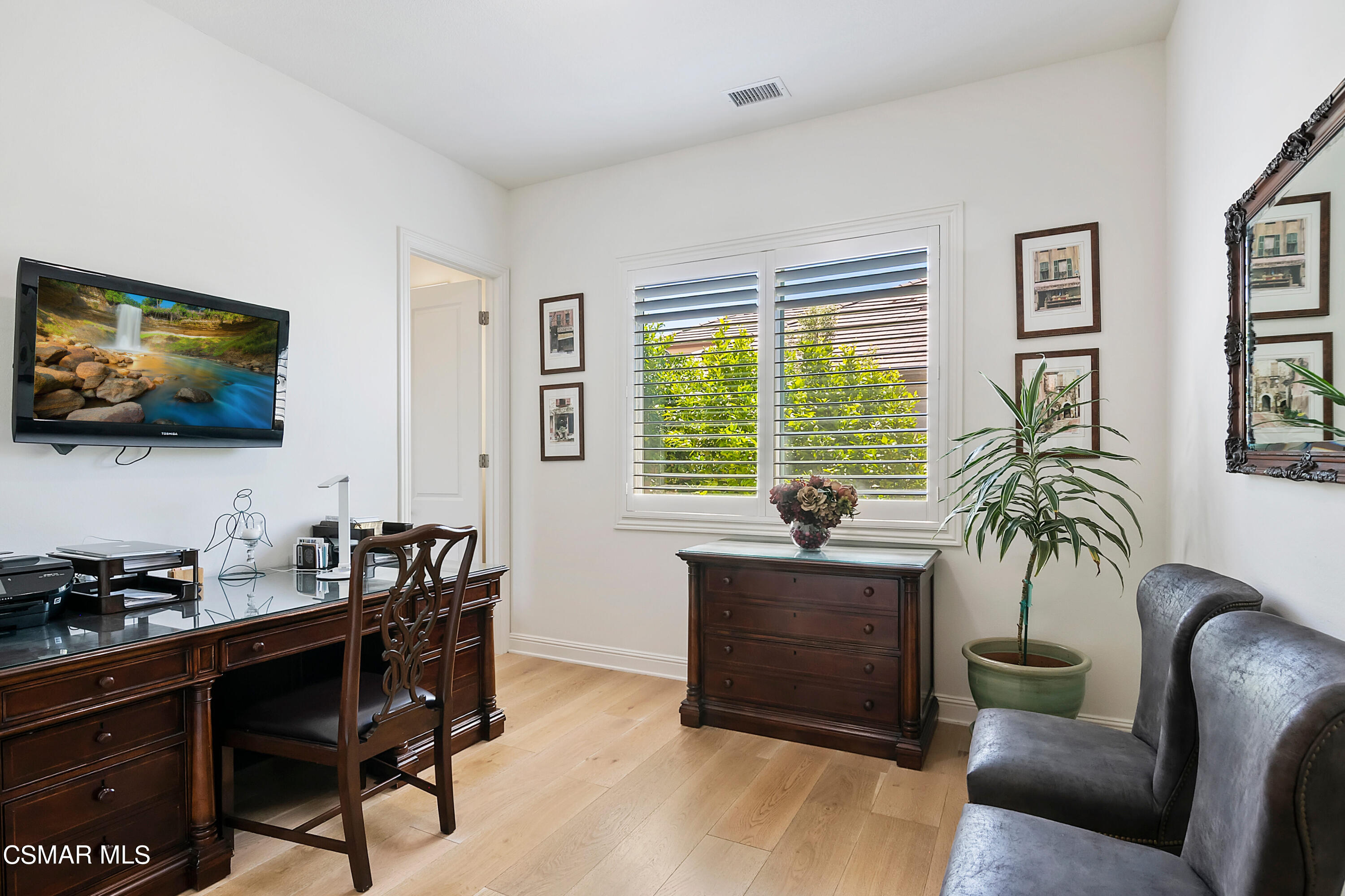 11342 Raes Creek Road Moorpark, CA 93021 - Photo 54 of 70 a living room with furniture and a flat screen tv