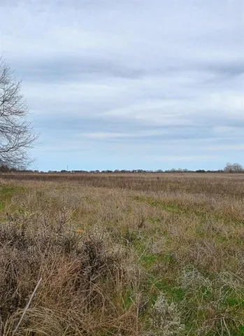 a view of an ocean and mountain