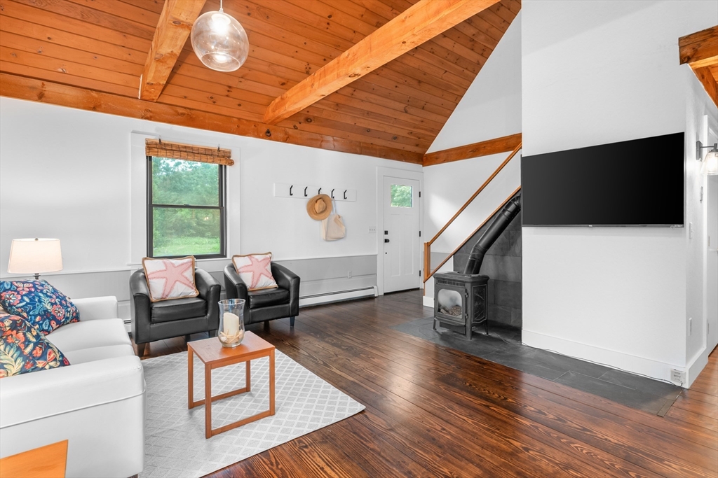 24 Chickadee Circle Chatham, MA 02633 - Photo 16 of 41 a living room with furniture and a flat screen tv