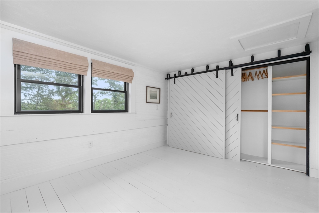 24 Chickadee Circle Chatham, MA 02633 - Photo 22 of 41 an empty room with windows and closet