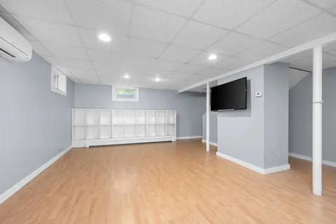 a view of an empty room with a flat screen tv