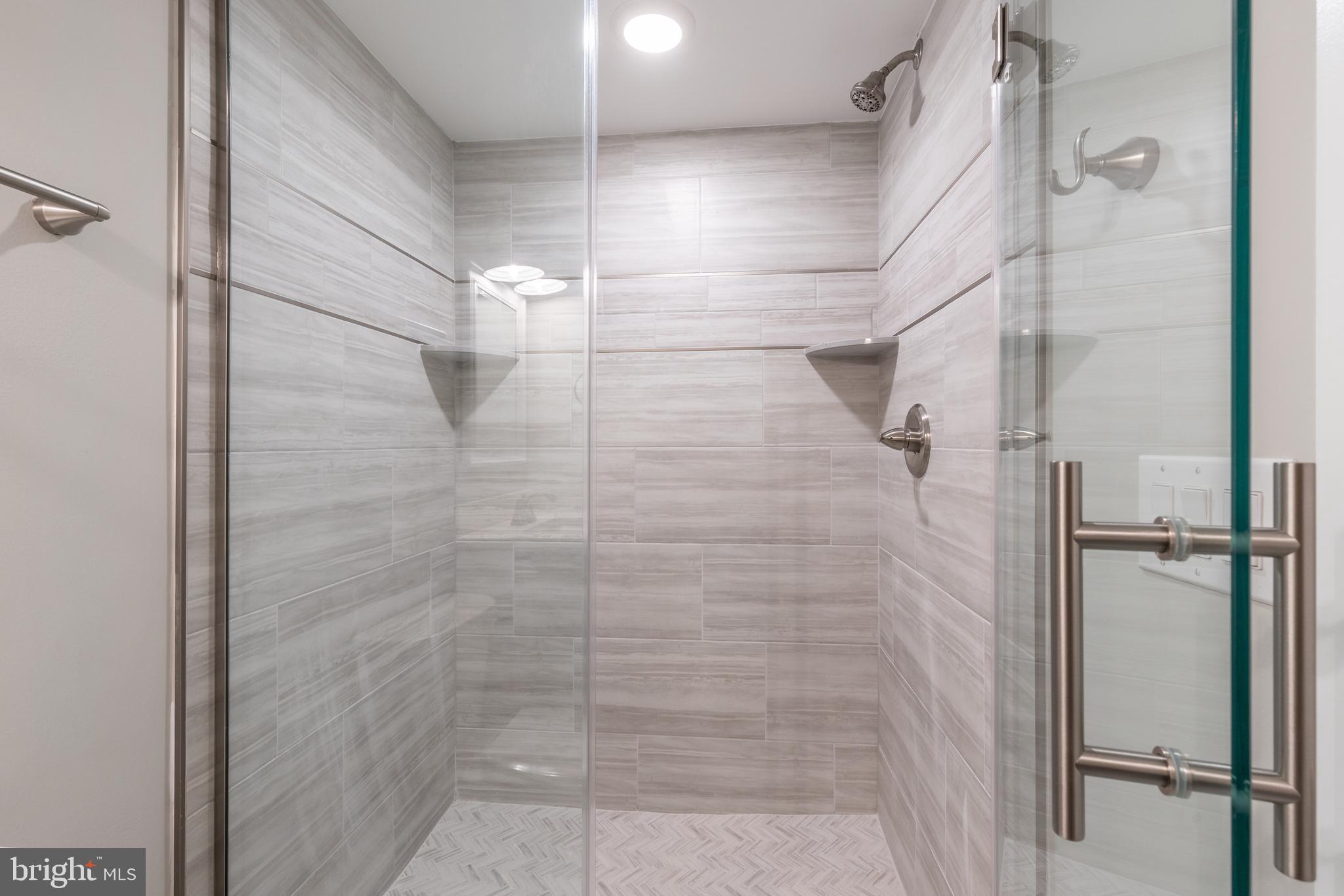135 West Huntingdon Street, Unit 1 Philadelphia, PA 19133 - Photo 12 of 29 a bathroom with a shower