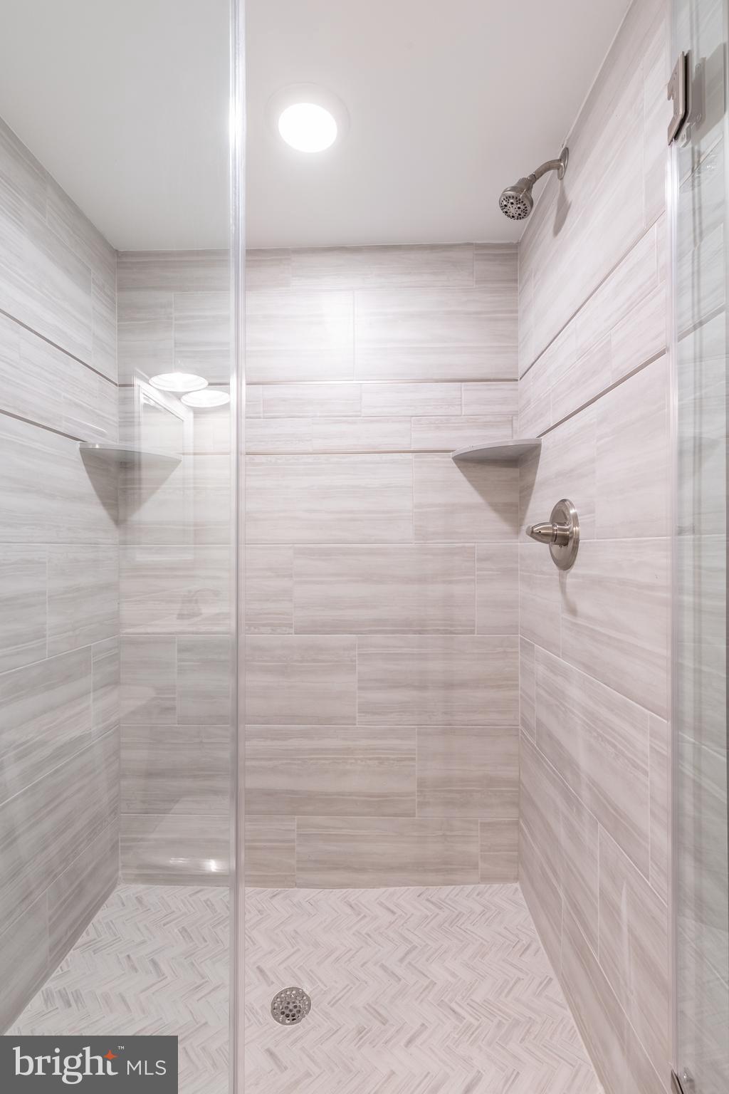 135 West Huntingdon Street, Unit 1 Philadelphia, PA 19133 - Photo 13 of 29 a bathroom with a shower