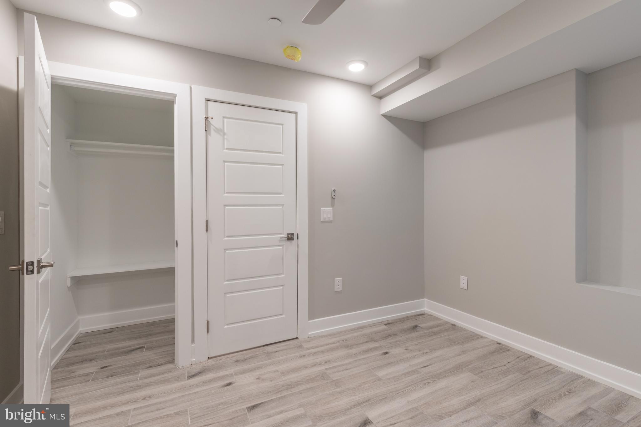 135 West Huntingdon Street, Unit 1 Philadelphia, PA 19133 - Photo 15 of 29 wooden floor in an empty room