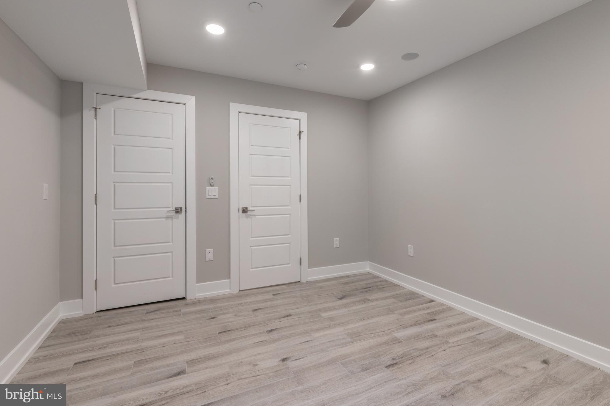 135 West Huntingdon Street, Unit 1 Philadelphia, PA 19133 - Photo 9 of 29 wooden floor in an empty room