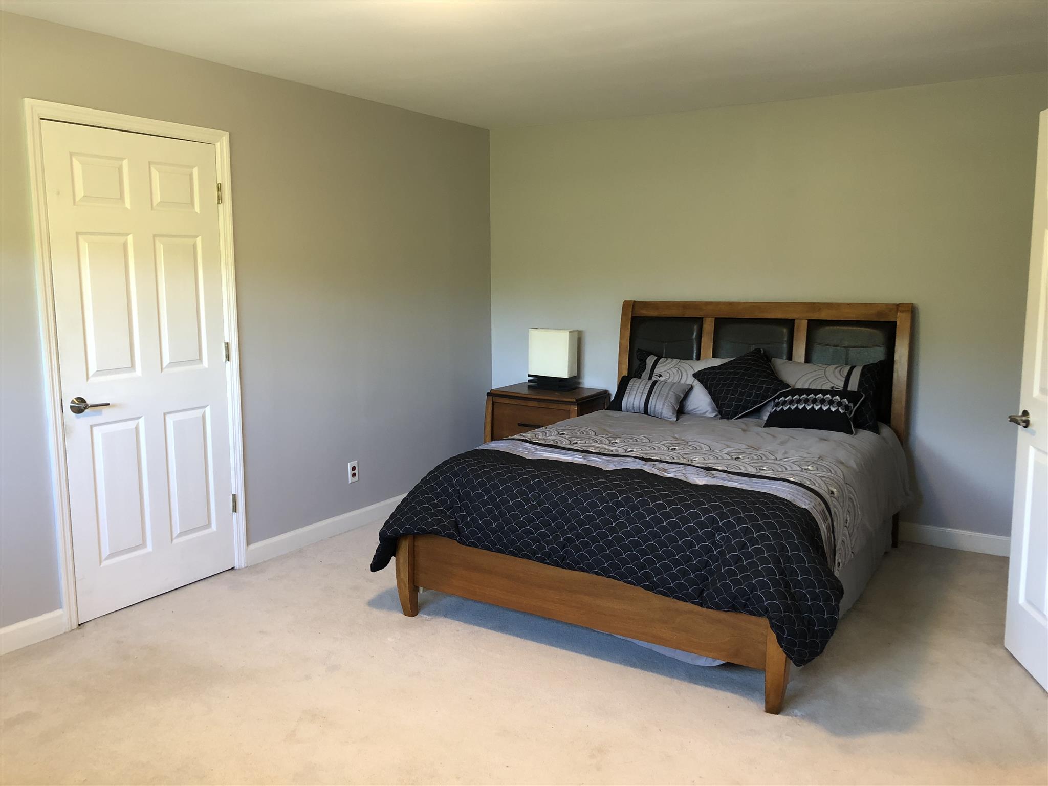 7620 Pinewood Road Primm Springs, TN 38476 - Photo 22 of 26 This is a potential upstairs MBR, behind the door is a WIC and a large second finished bonus space with endless options!