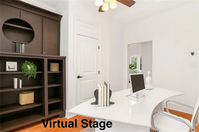 a kitchen with a refrigerator and a stove top oven