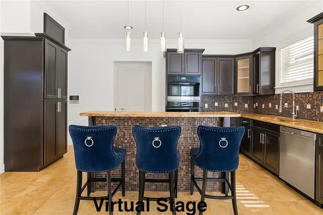 a view of a kitchen with kitchen island granite countertop wooden cabinets and stainless steel appliances