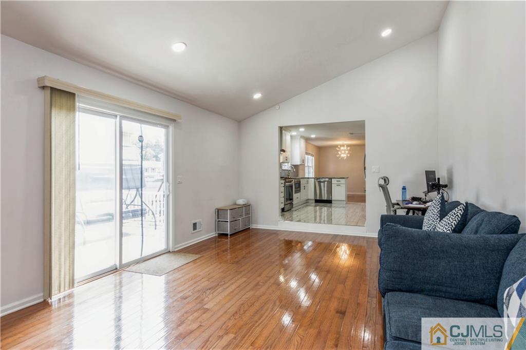 31 Hancock Road Piscataway, NJ 08854 - Photo 12 of 29 a living room with furniture and a large window