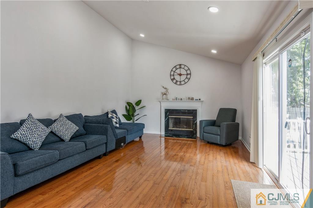 31 Hancock Road Piscataway, NJ 08854 - Photo 13 of 29 a living room with furniture and a fireplace