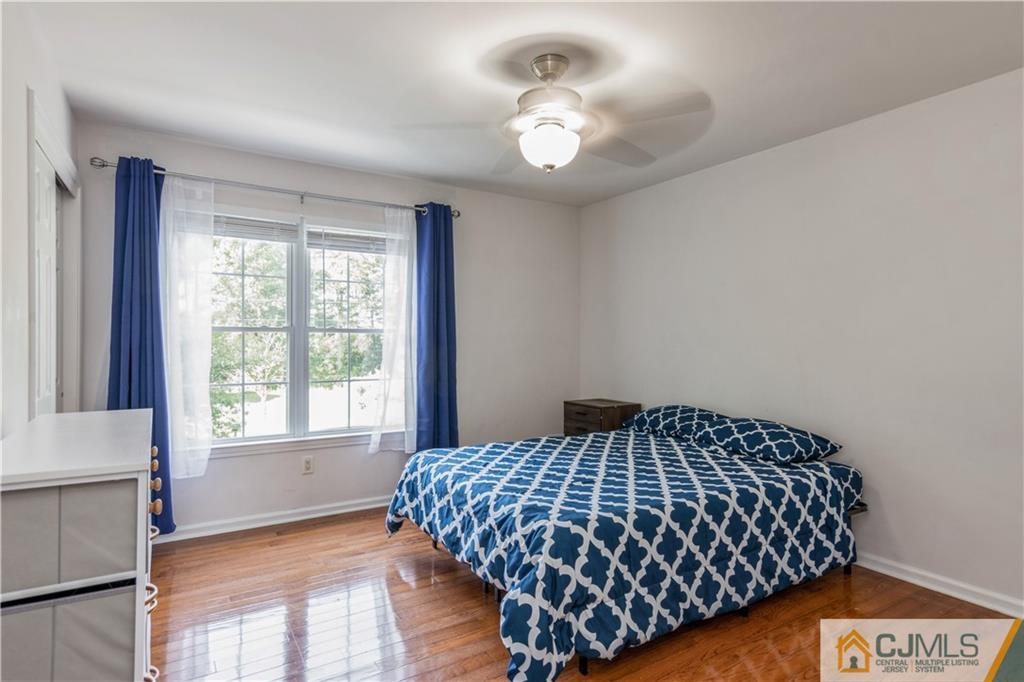 31 Hancock Road Piscataway, NJ 08854 - Photo 20 of 29 a bedroom with a bed and a window