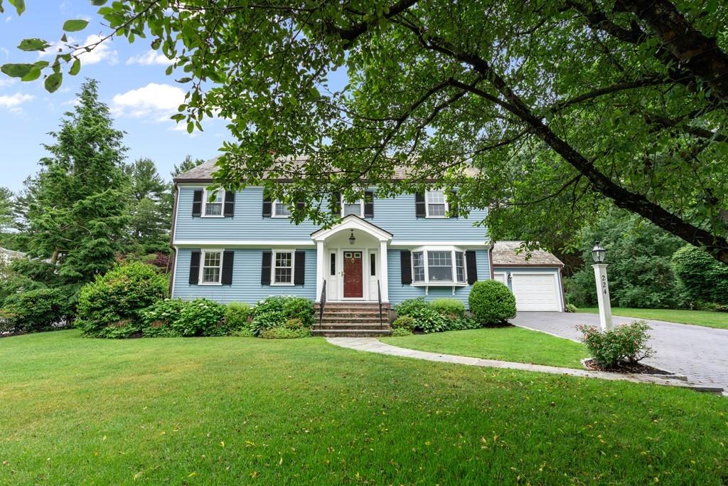 224 Rutledge Road Belmont, MA 02478 - Photo 1 of 30 a front view of a house with a yard
