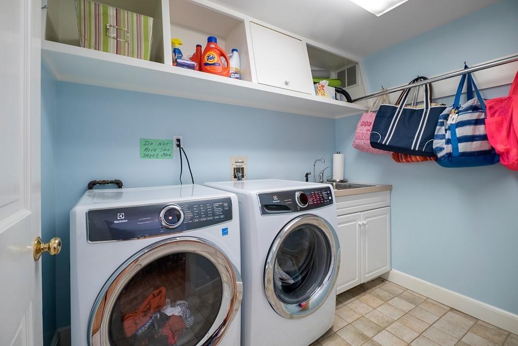 224 Rutledge Road Belmont, MA 02478 - Photo 14 of 30 a utility room with dryer and washer