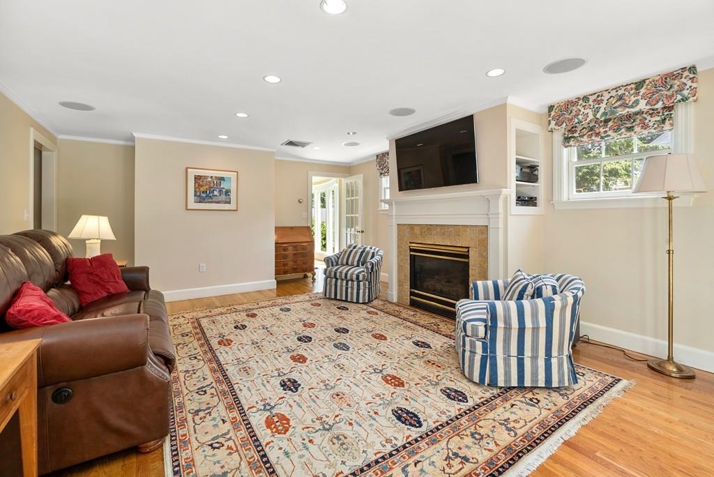 224 Rutledge Road Belmont, MA 02478 - Photo 7 of 30 a living room with furniture fireplace and flat screen tv