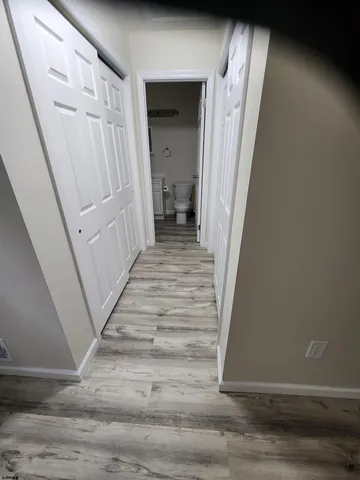 a view of a hallway view with staircase