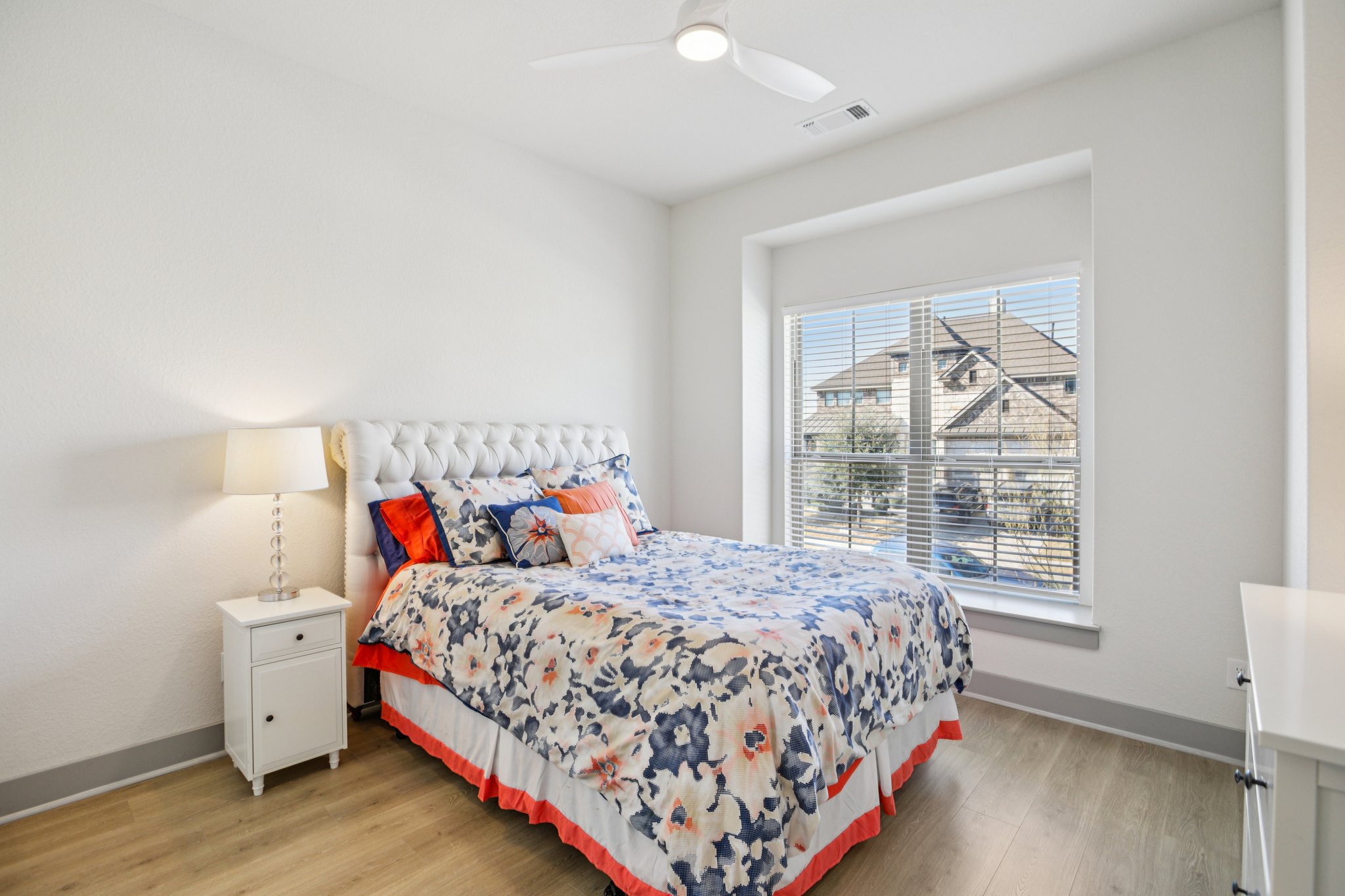 133 Lake Spring Circle Georgetown, TX 78633 - Photo 19 of 31 a bedroom with a bed and a window