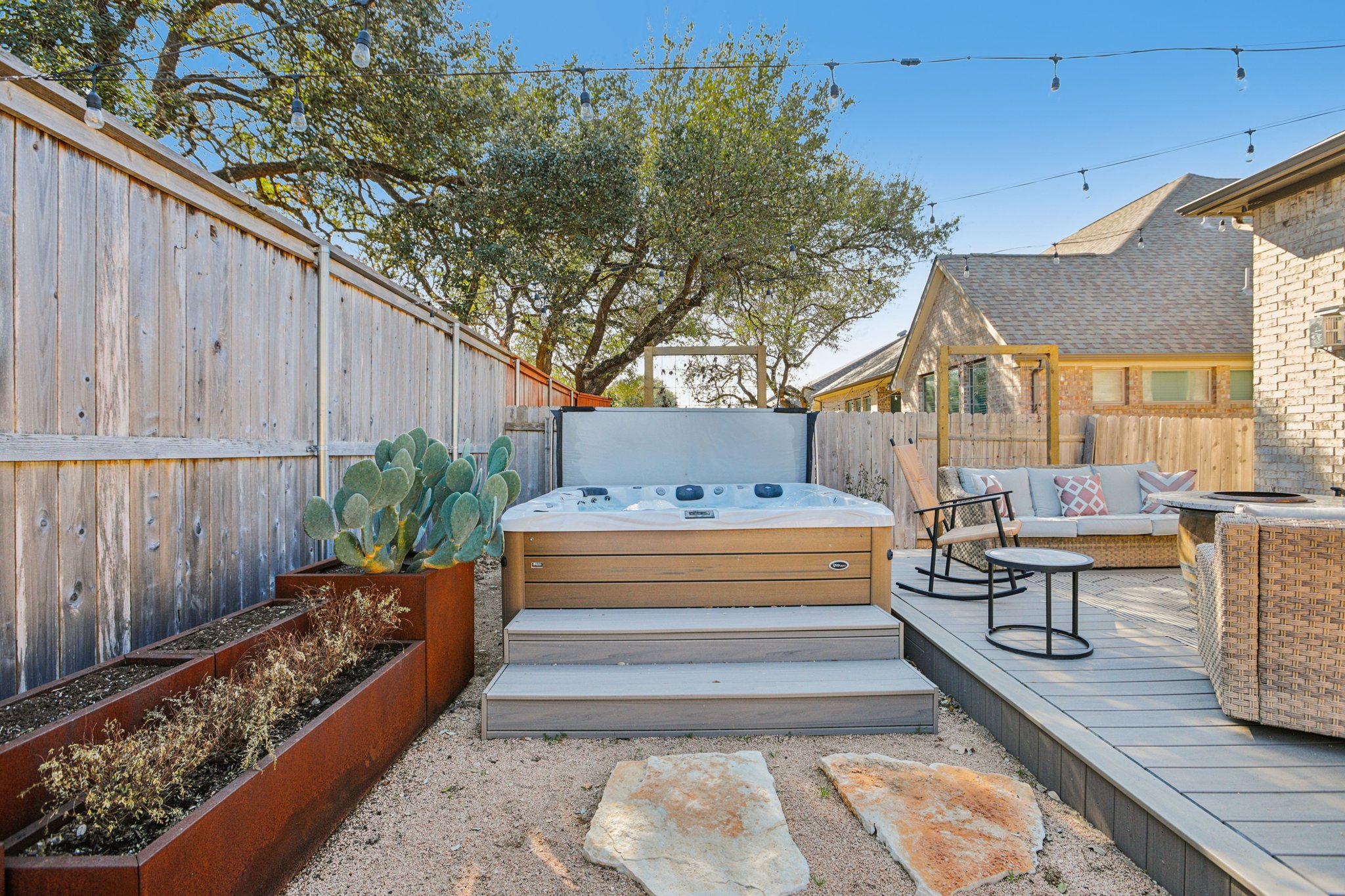 133 Lake Spring Circle Georgetown, TX 78633 - Photo 25 of 31 a view of house with backyard outdoor seating and barbeque oven