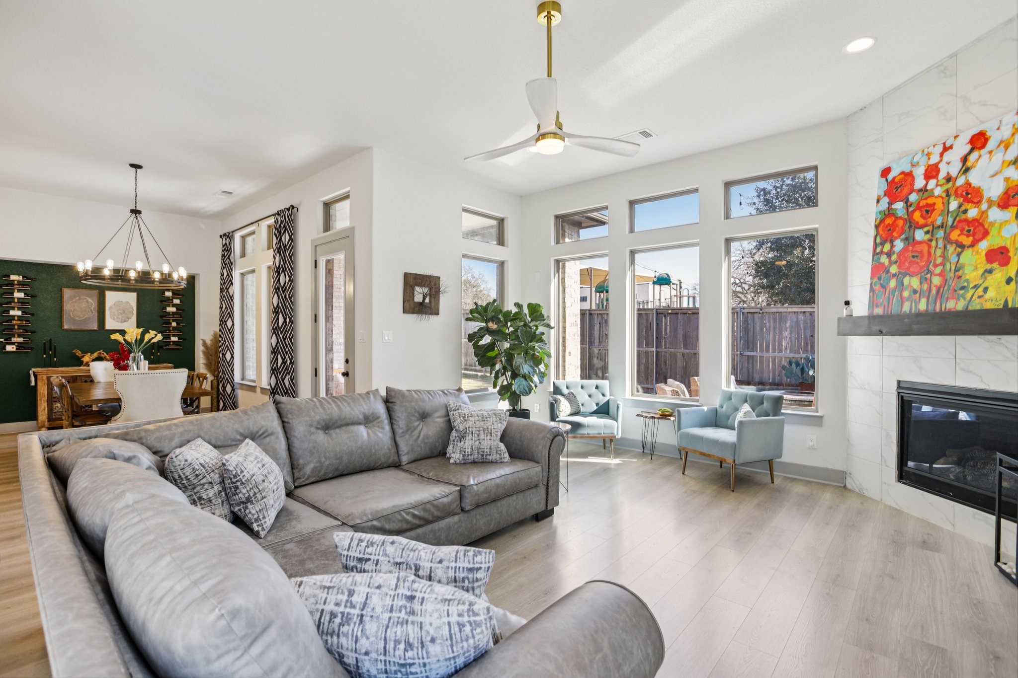 133 Lake Spring Circle Georgetown, TX 78633 - Photo 4 of 31 a living room with furniture fireplace and a large window