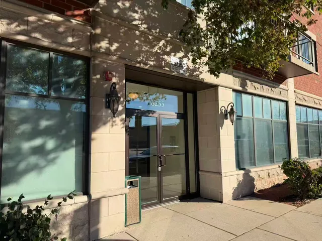 a kitchen with stainless steel appliances granite countertop a refrigerator stove and microwave