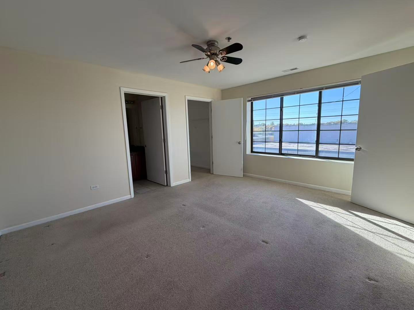 8255 Skokie Boulevard, Unit 406 Skokie, IL 60077 - Photo 8 of 16 a view of an empty room with a window