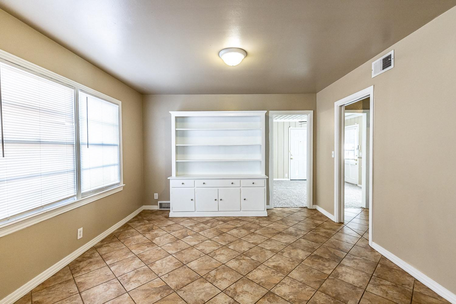 3708 27th Street Lubbock, TX 79410 - Photo 5 of 23 a view of room and window