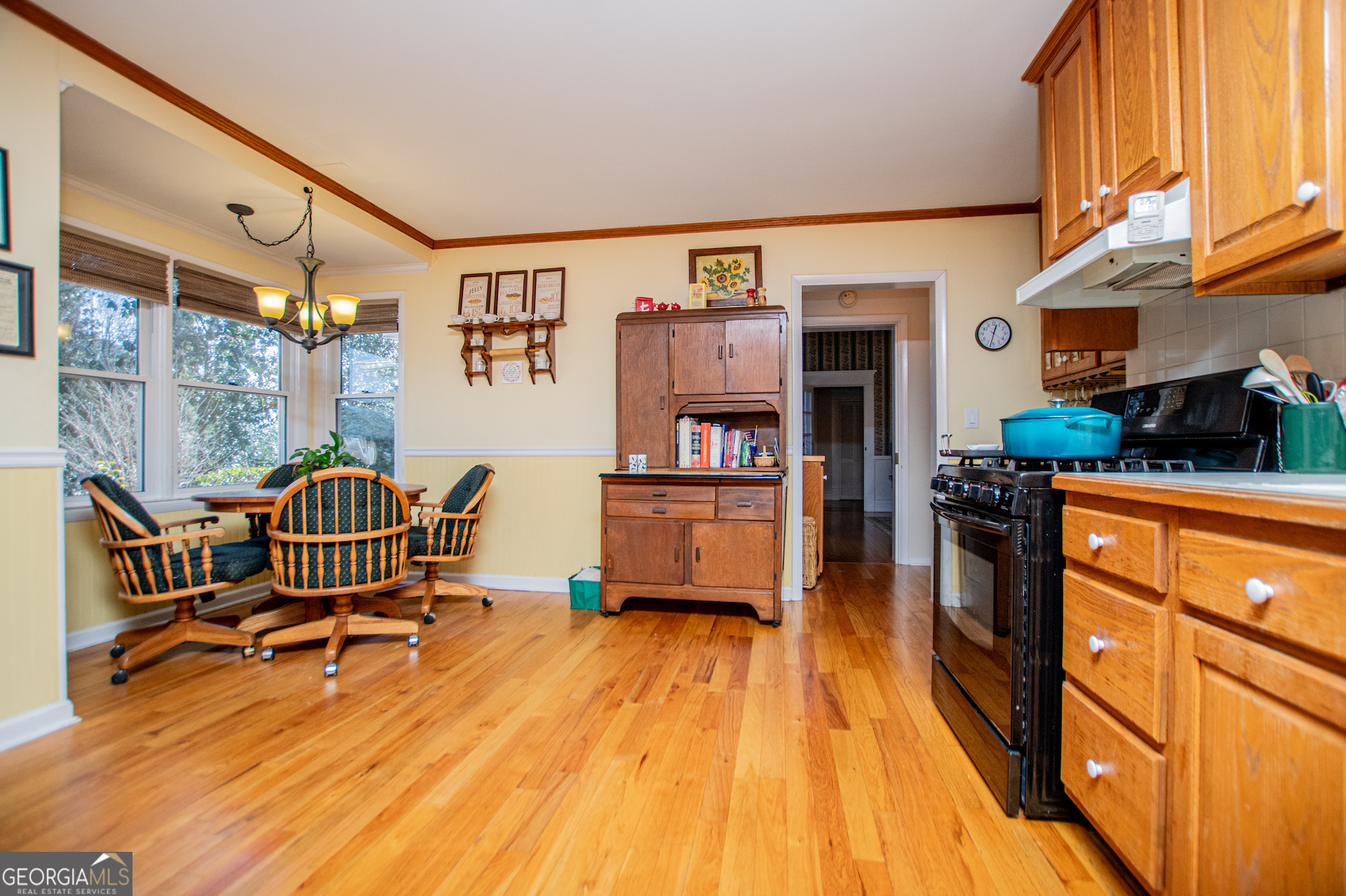 310 Kramer Street Carrollton, GA 30117 - Photo 16 of 99 a living room with furniture and a wooden floor