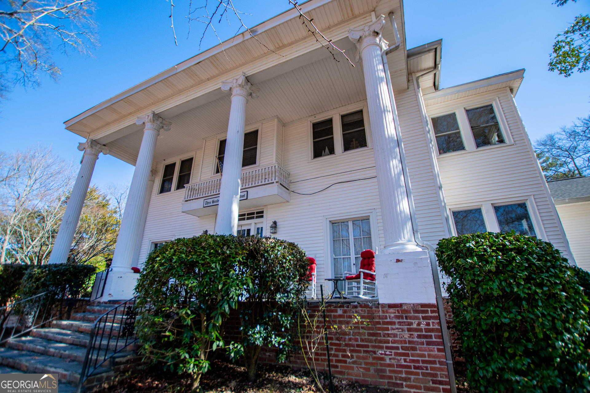 310 Kramer Street Carrollton, GA 30117 - Photo 23 of 99 a front view of a house with a yard