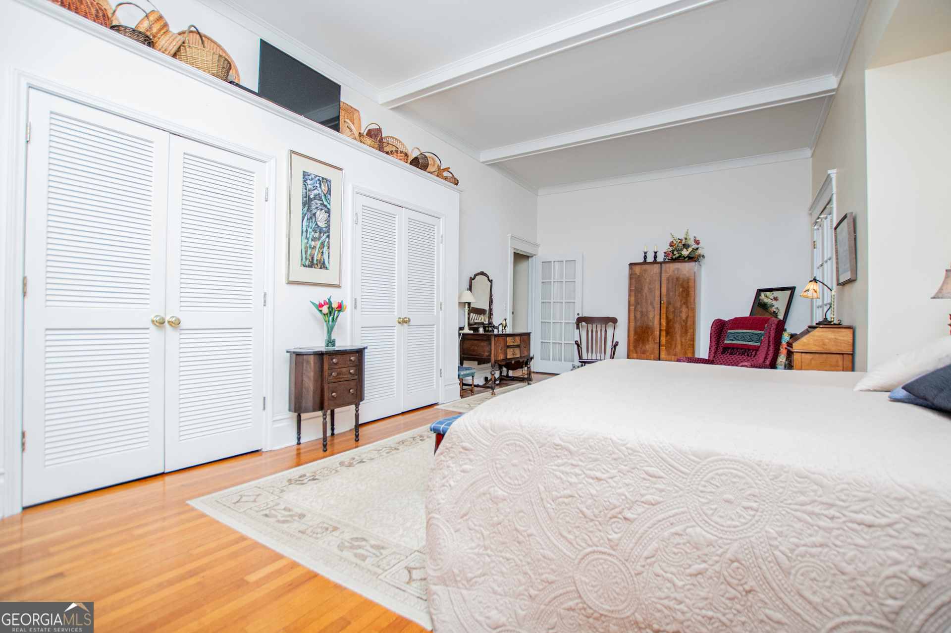 310 Kramer Street Carrollton, GA 30117 - Photo 28 of 99 a bed room with a bed and a chair