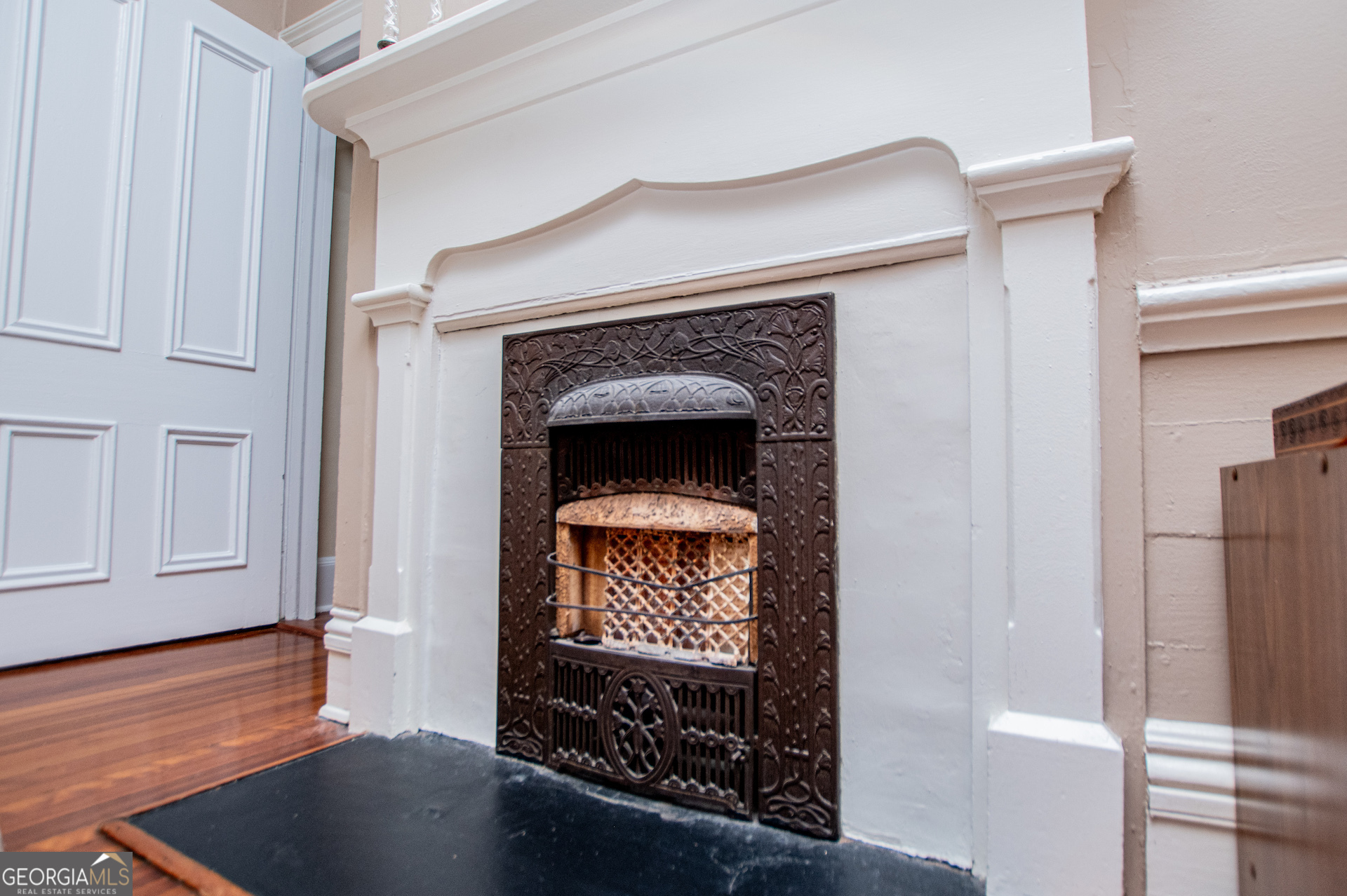 310 Kramer Street Carrollton, GA 30117 - Photo 41 of 99 a living room with a fireplace