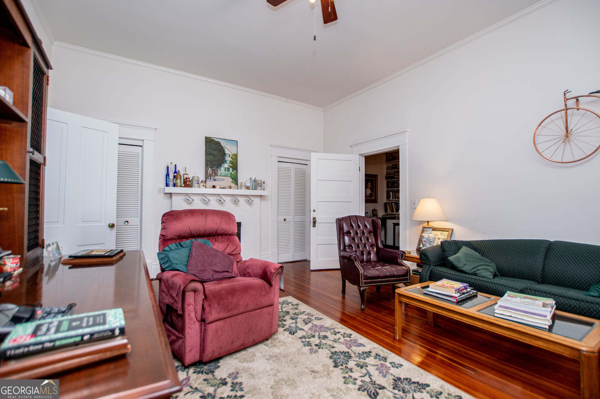 310 Kramer Street Carrollton, GA 30117 - Photo 46 of 99 a living room with furniture and wooden floor