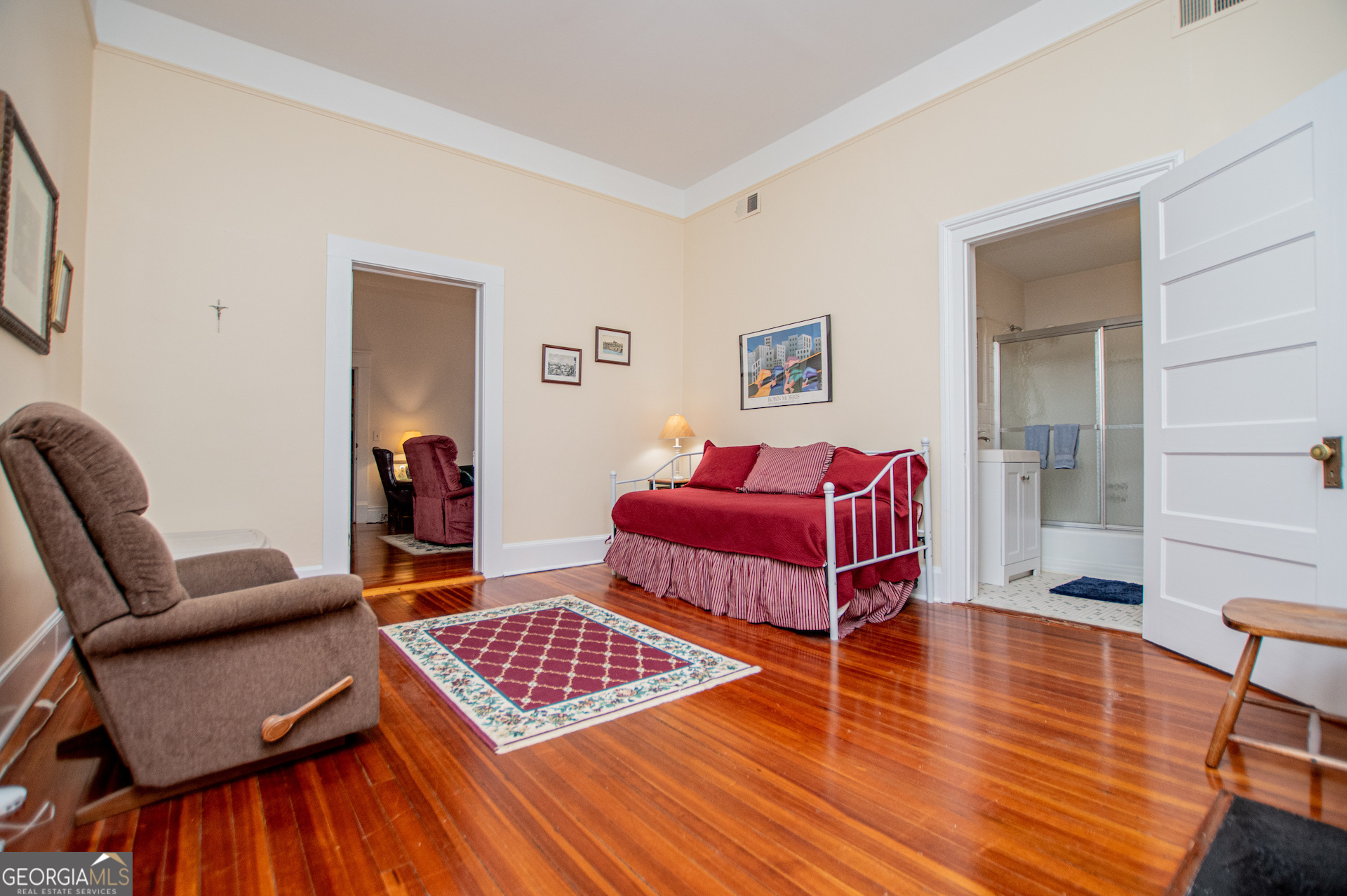 310 Kramer Street Carrollton, GA 30117 - Photo 51 of 99 a living room with furniture and a wooden floor