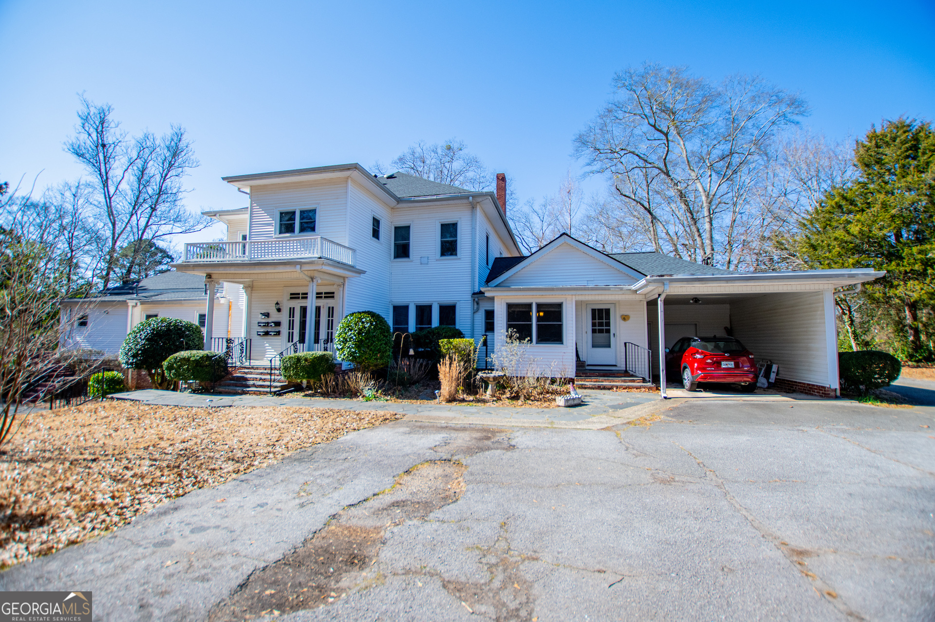 310 Kramer Street Carrollton, GA 30117 - Photo 69 of 99 a view of a parked cars in front of a building