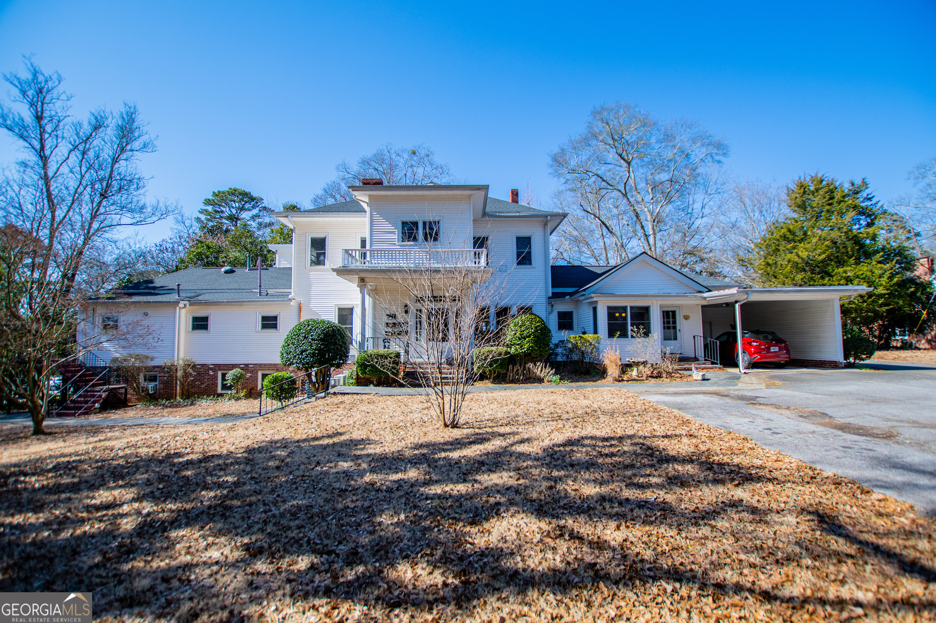 310 Kramer Street Carrollton, GA 30117 - Photo 70 of 99 a front view of a house with a yard