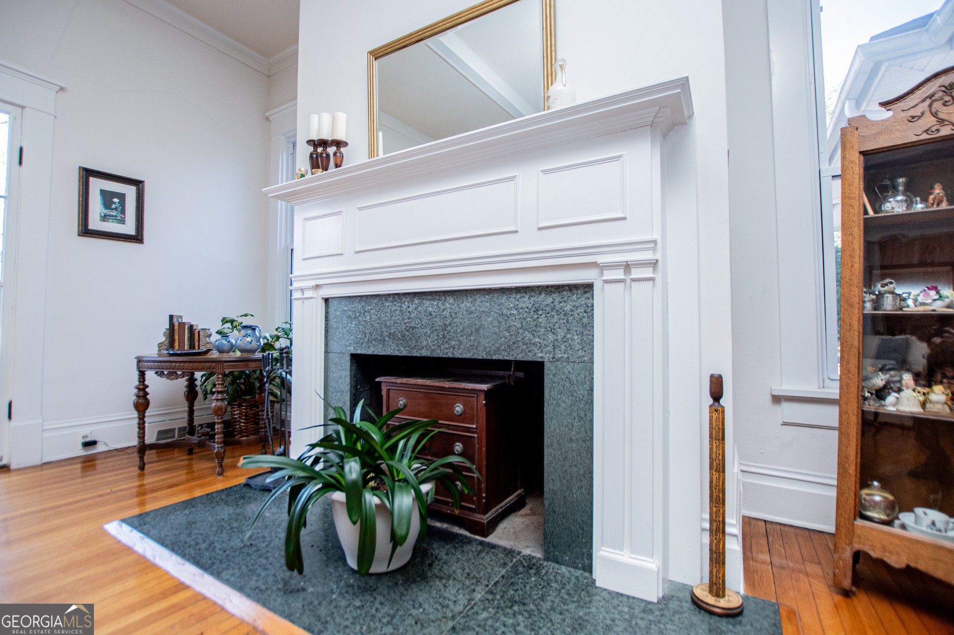 310 Kramer Street Carrollton, GA 30117 - Photo 7 of 99 a living room with furniture and a fireplace
