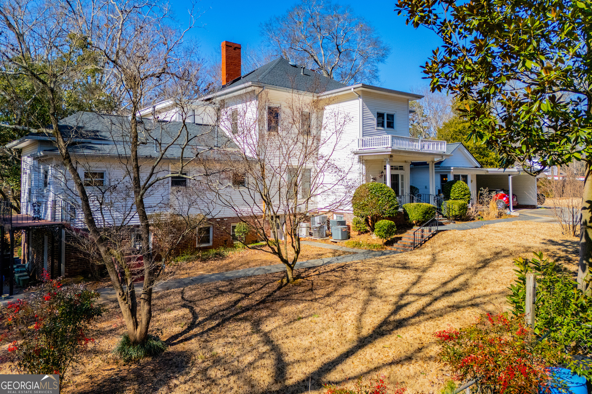 310 Kramer Street Carrollton, GA 30117 - Photo 84 of 99 a front view of a house with a yard