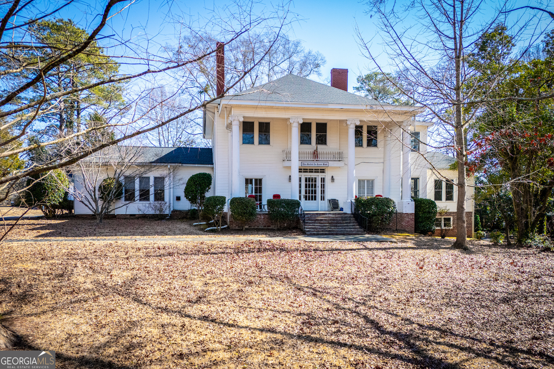 310 Kramer Street Carrollton, GA 30117 - Photo 89 of 99 a front view of a house with a yard covered with snow