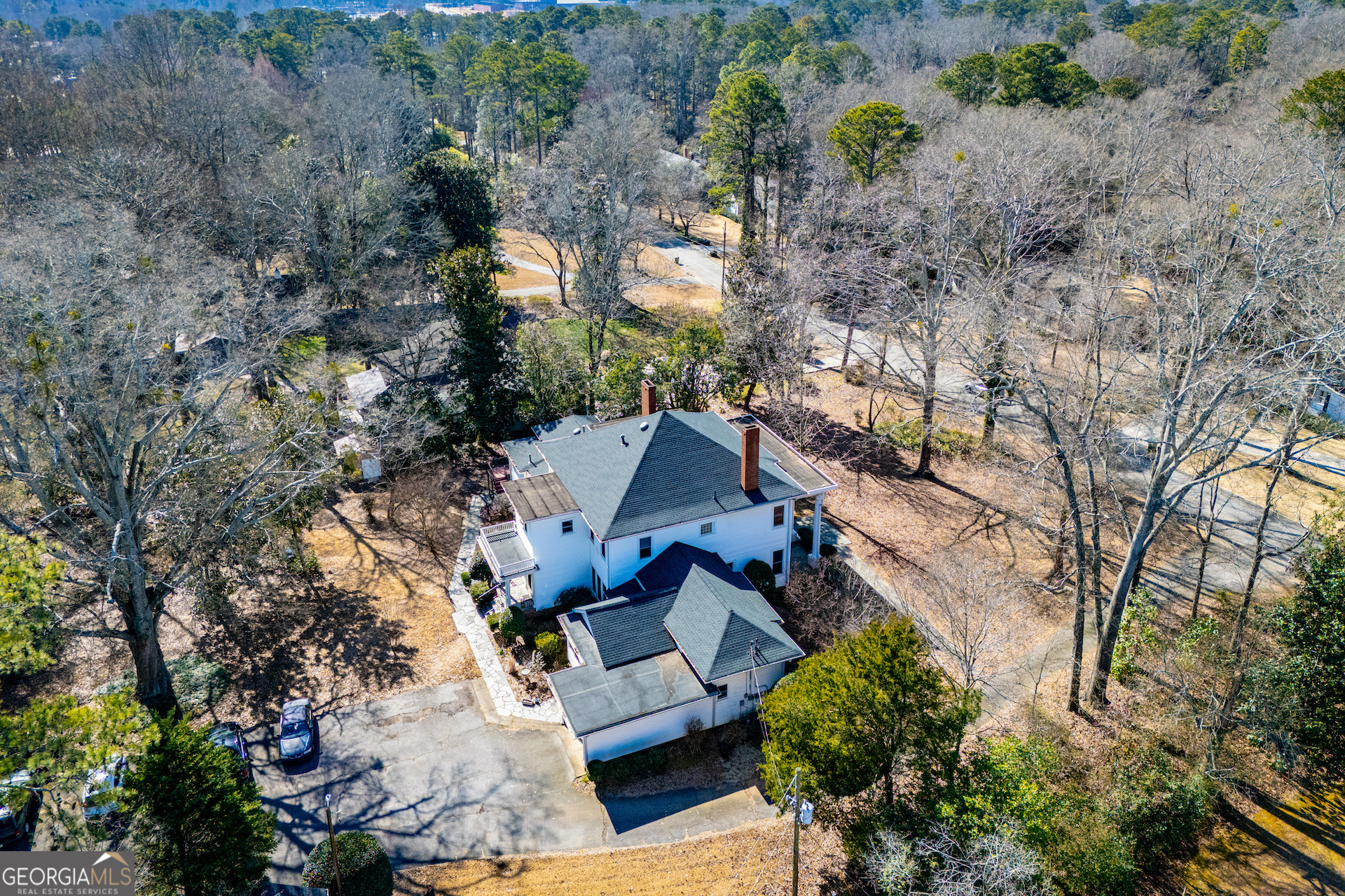 310 Kramer Street Carrollton, GA 30117 - Photo 96 of 99 an aerial view of multiple houses with yard