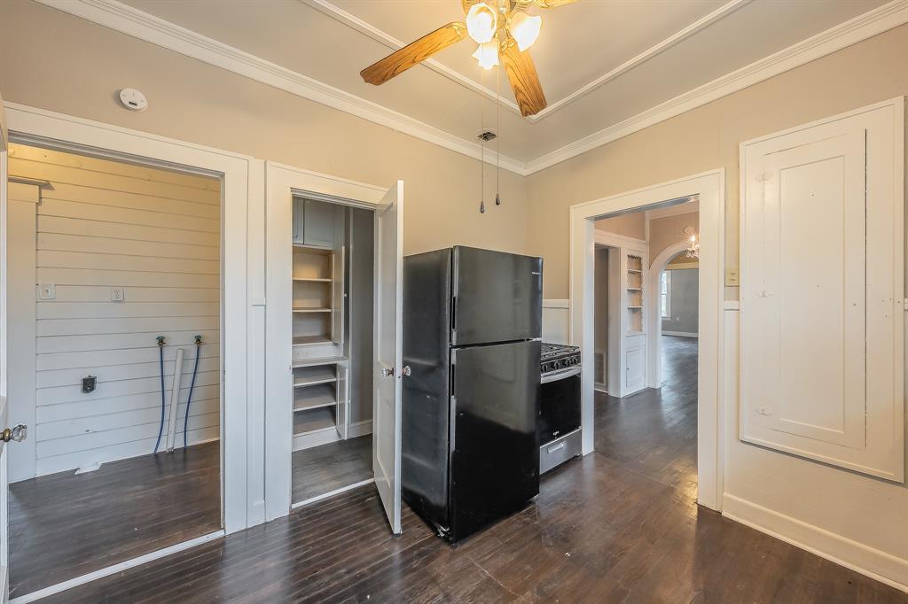 1500 Proctor Avenue Waco, TX 76708 - Photo 21 of 40 Kitchen area featuring wood flooring, a refrigerator, and a range