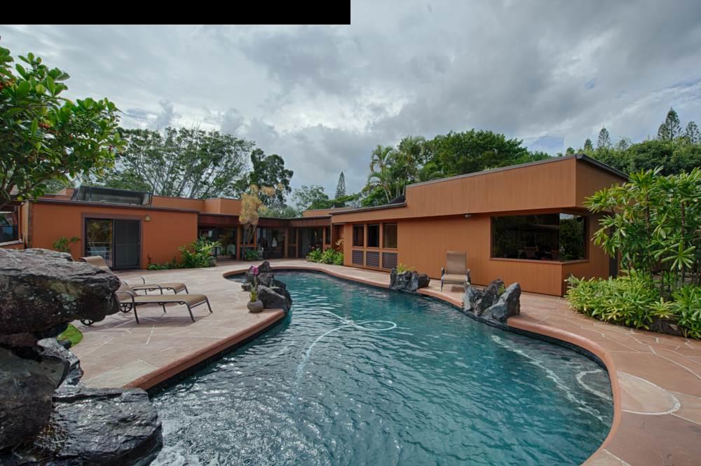 107 West Kuiaha Road Haiku, HI 96708 - Photo 18 of 20 a view of a house with backyard sitting area and garden
