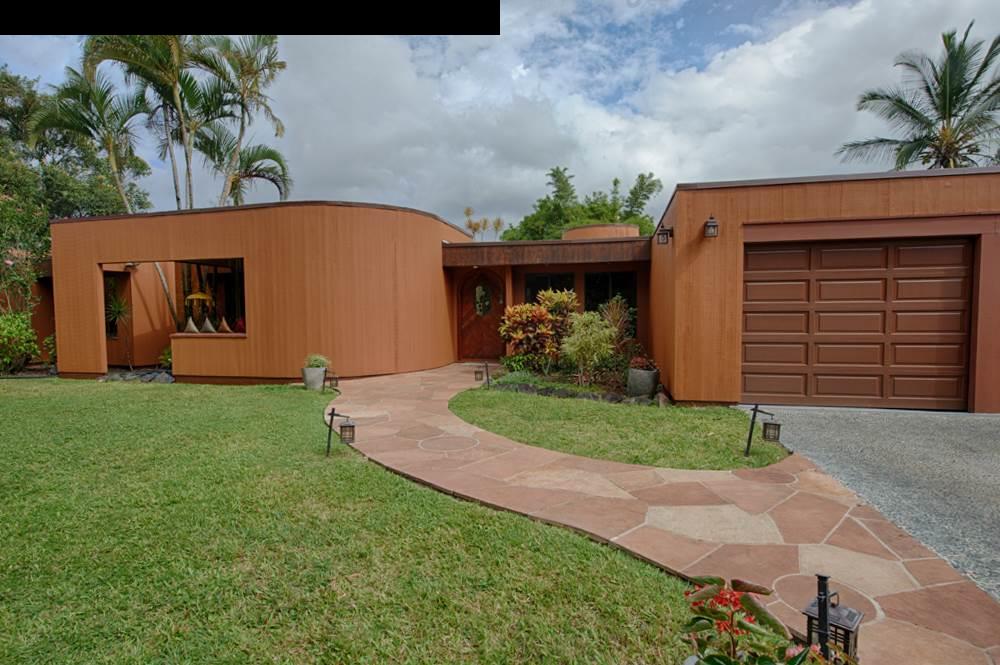 107 West Kuiaha Road Haiku, HI 96708 - Photo 2 of 20 a front view of a house with garden