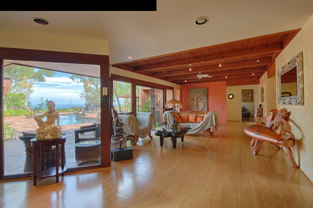 107 West Kuiaha Road Haiku, HI 96708 - Photo 3 of 20 a living room with lots of furniture wooden floor and a large window