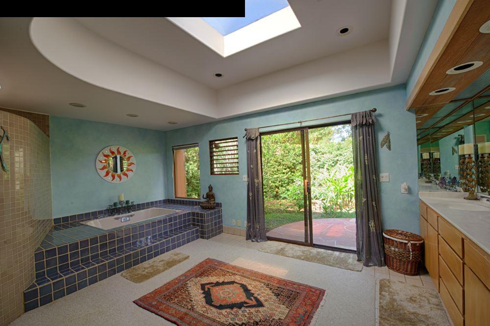 107 West Kuiaha Road Haiku, HI 96708 - Photo 6 of 20 a living room with furniture and a floor to ceiling window