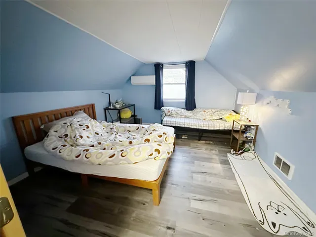 a living room with dining table