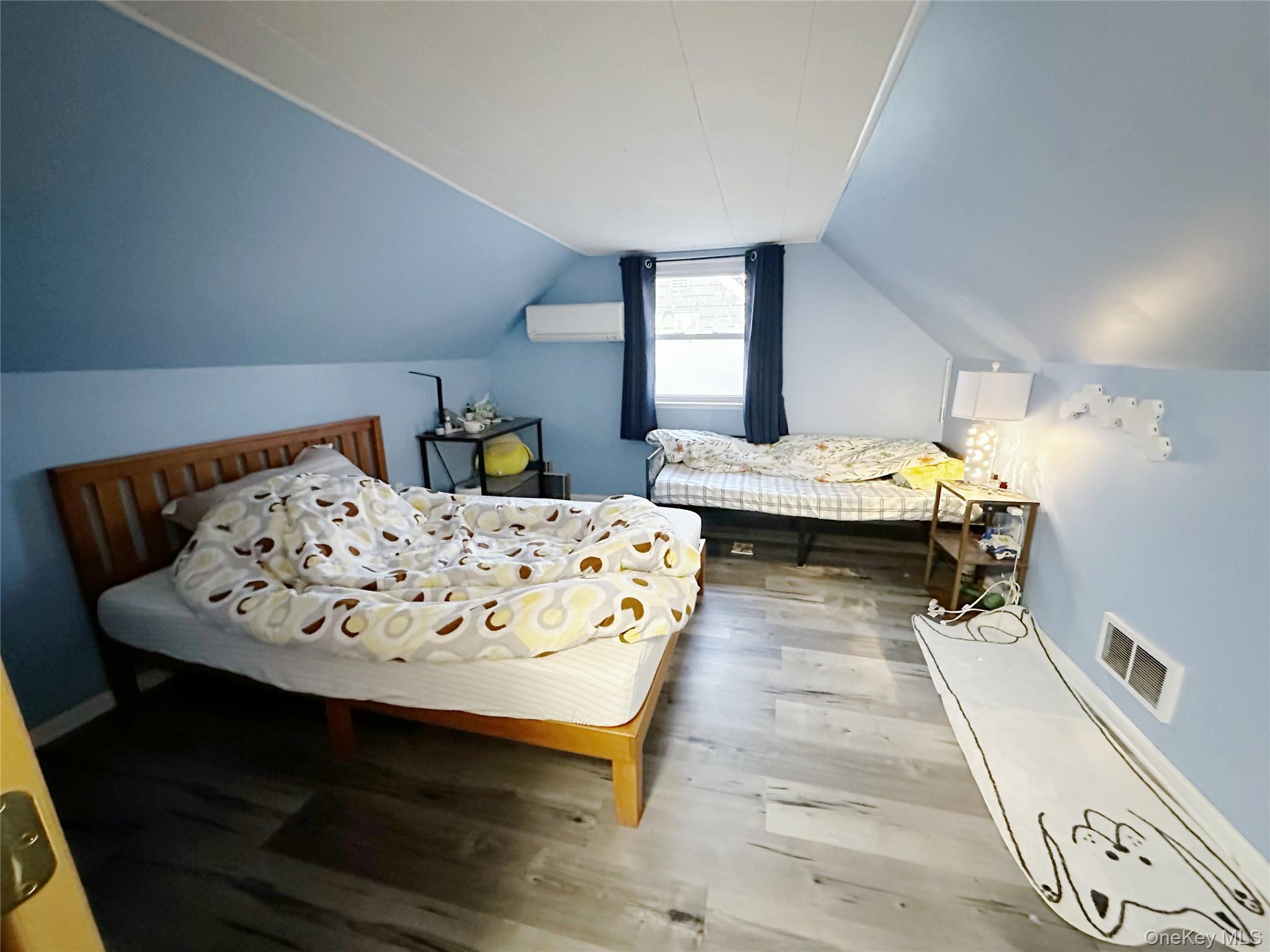 69 Virginia Avenue Plainview, NY 11803 - Photo 5 of 9 a living room with dining table