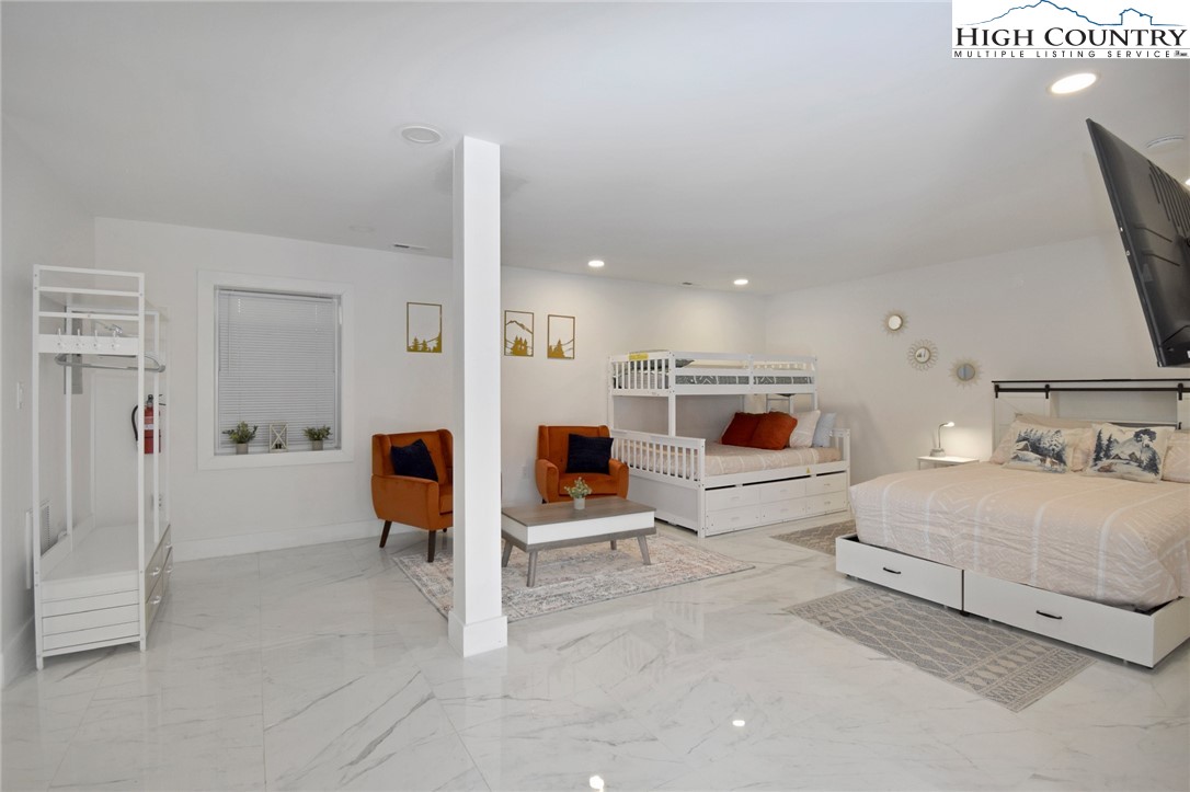 269 Willow Mountain Drive Vilas, NC 28692 - Photo 24 of 37 a living room with furniture and a flat screen tv