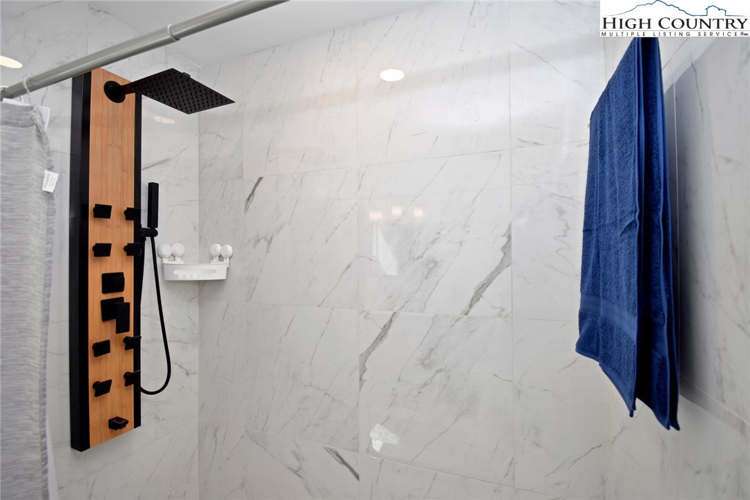 269 Willow Mountain Drive Vilas, NC 28692 - Photo 33 of 37 a bathroom with a shower